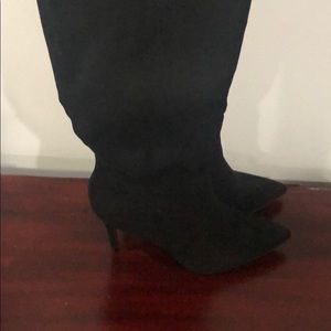 Tall high heel pointed boots